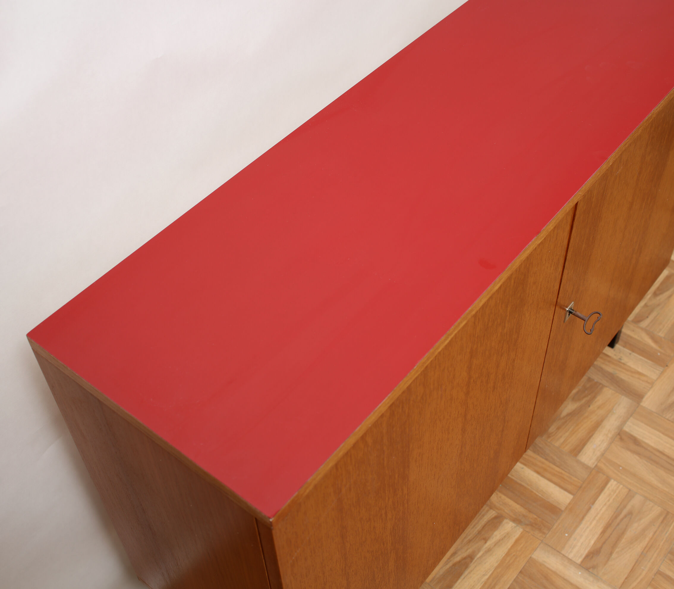 1960s sideboard in teak and formica red
