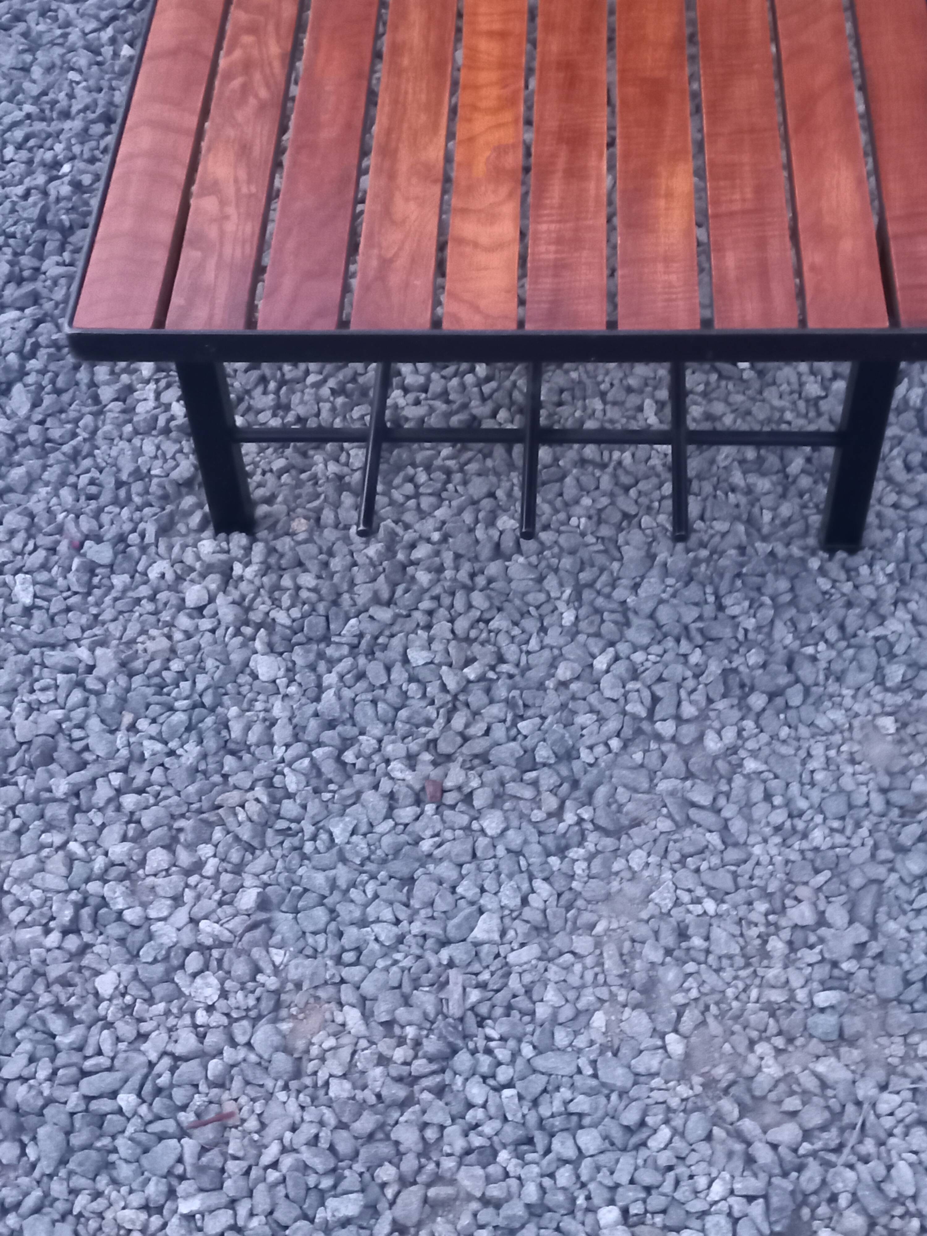 1970s design coffee table with ceramic and wood top, metal legs.