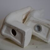 Handends in the shape of vintage white ceramic