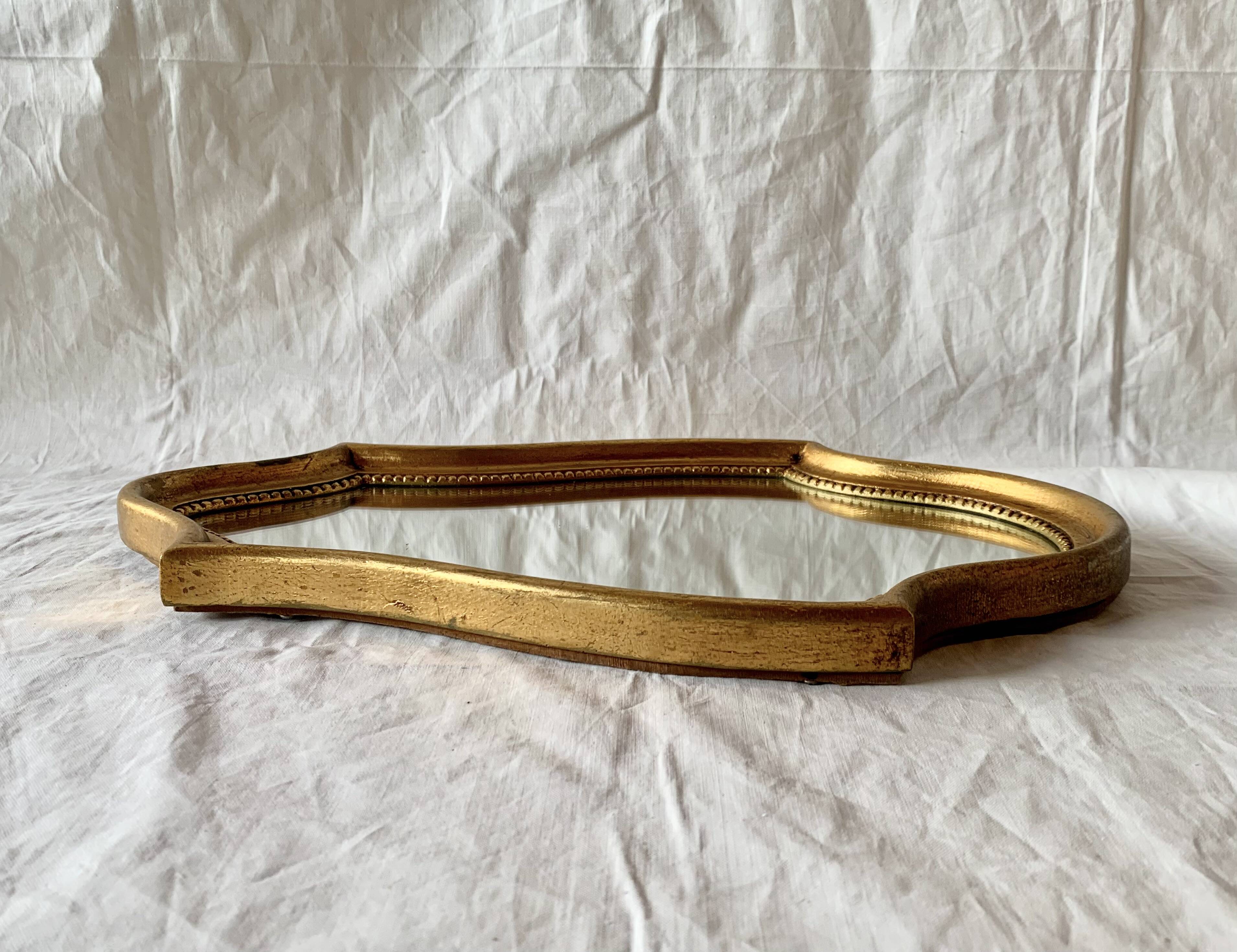 Vintage wall mirror in gilded wood