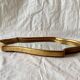 Miroir mural vintage en bois doré
