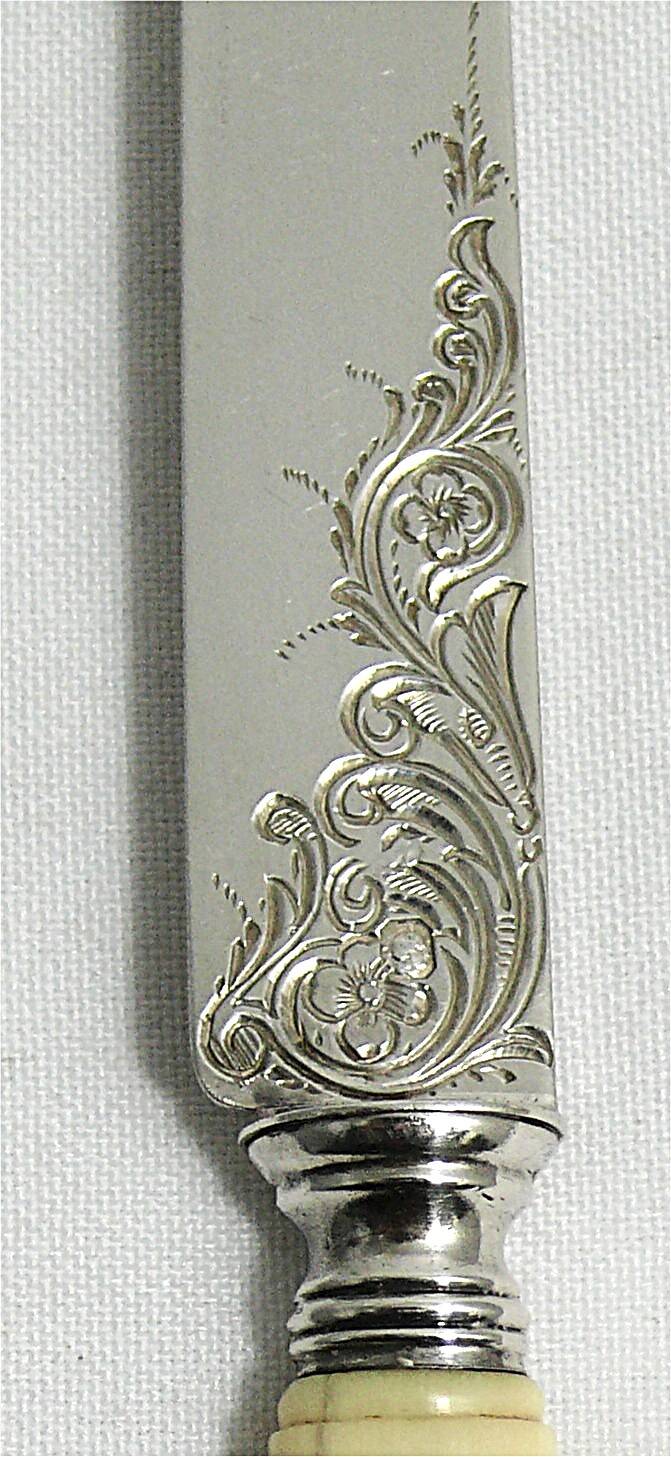 12 fruit knives, dessert knives, serving knives, engraved silver blades.