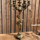 Large bronze candle holder with putti angel