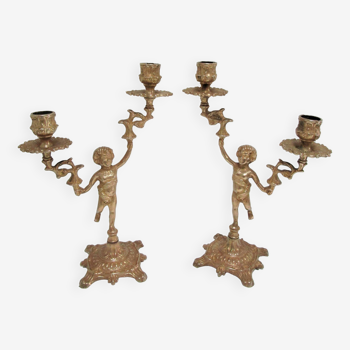 Pair of vintage golden brass cherub candlesticks