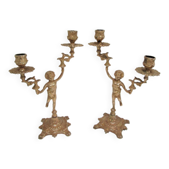 Pair of vintage golden brass cherub candlesticks