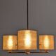 Three-light chandelier in mother-of-pearl and brass, Maison Arlus, France, circa 1950.