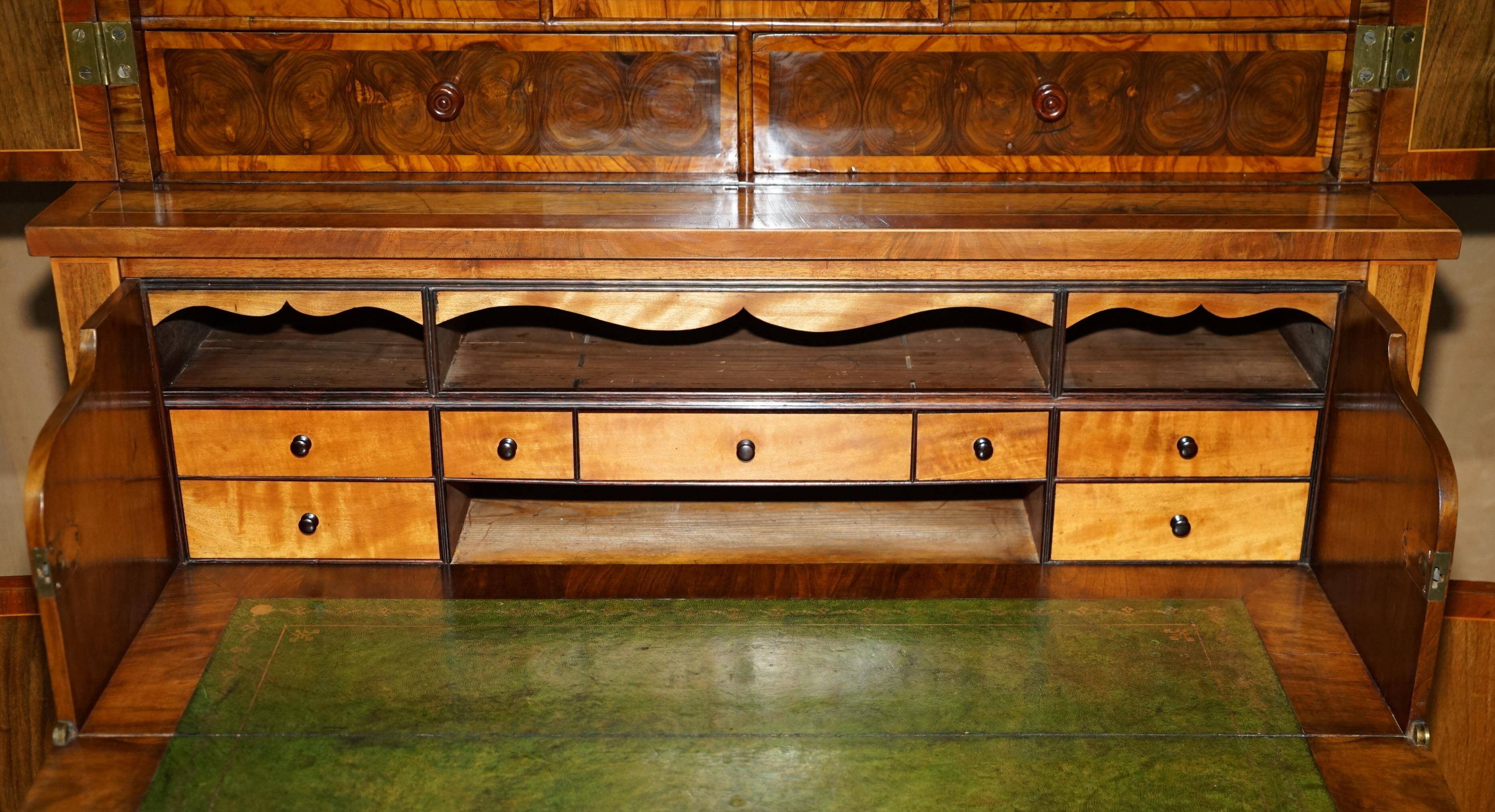 Queen Anne style pedestal commode from around 1710 in walnut and oyster veneer.
