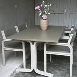 Dining table set and 4 dining chairs by Pierre Mennen for Pastoe.