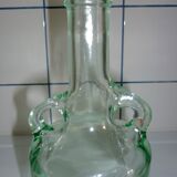 Bouteille ancienne en verre moulée transparente