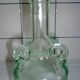 Old transparent moulded glass bottle