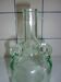 Bouteille ancienne en verre moulée transparente