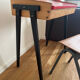 Vintage 1960s school desk with a red Formica top.