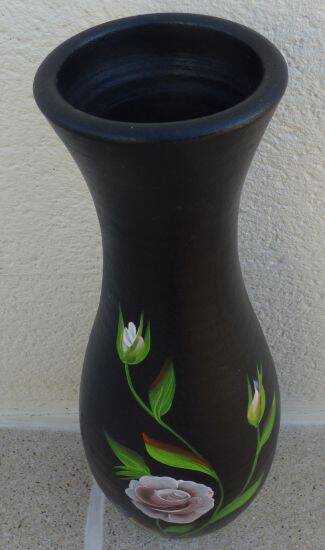 Very large black vase decorated with flowers, height 61.50 cm.