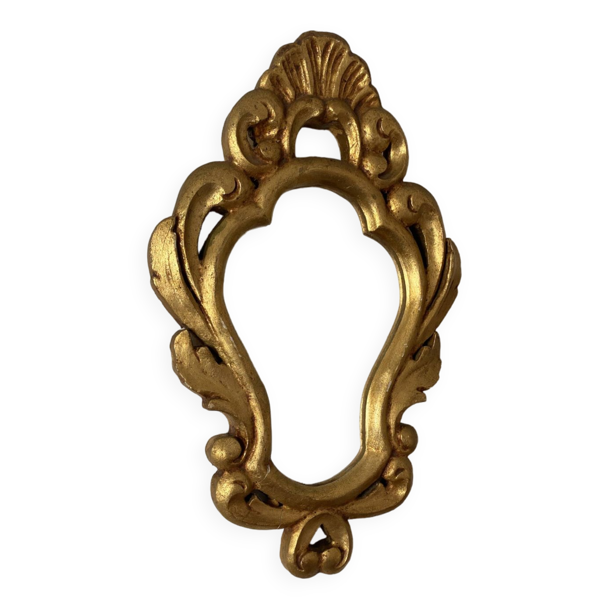 Golden mirror in baroque style.