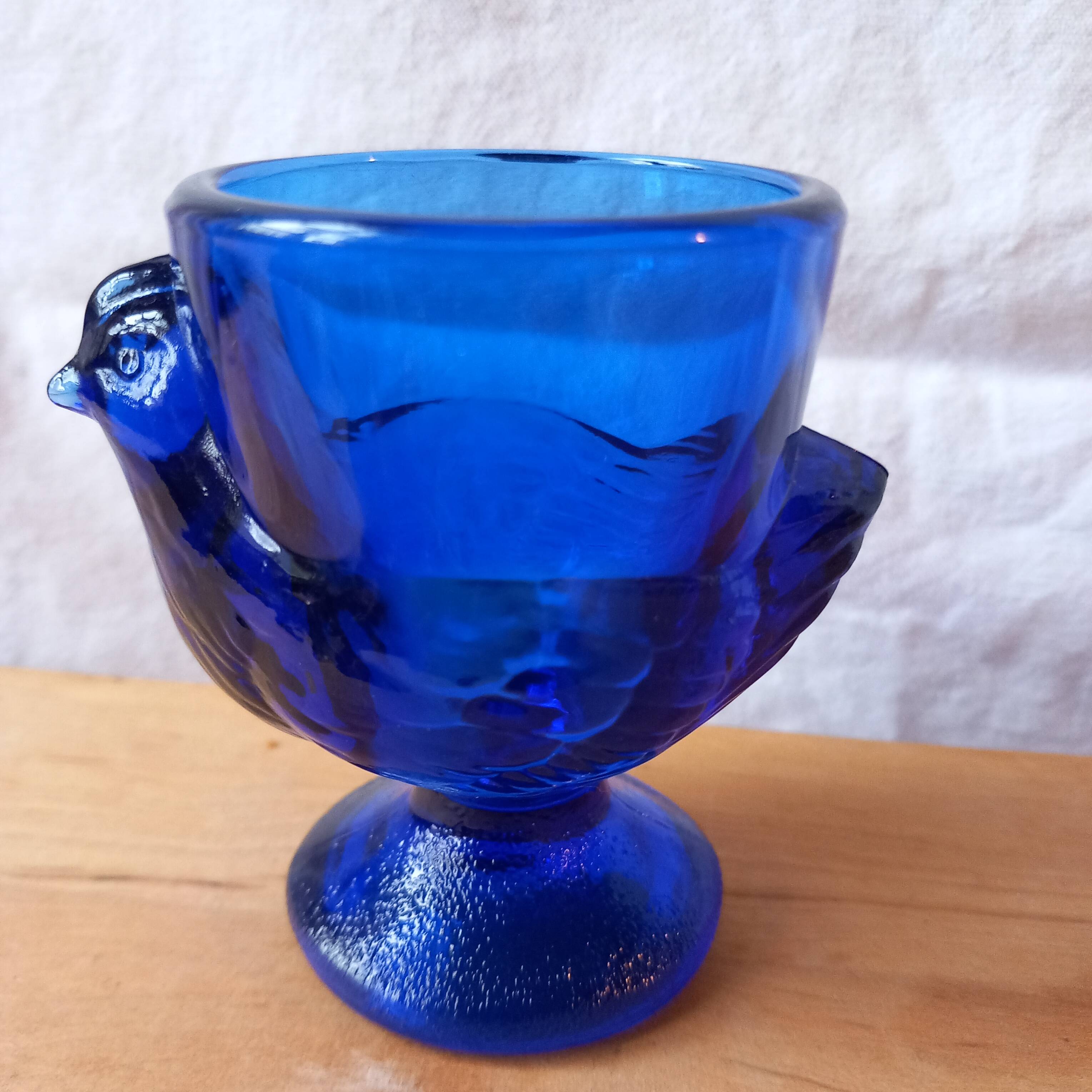 4 chicken-shaped egg cups in cobalt blue glass