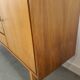 Mid-century notenhout fineer dressoir met 3 lades
