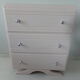 Commode pieds moustache