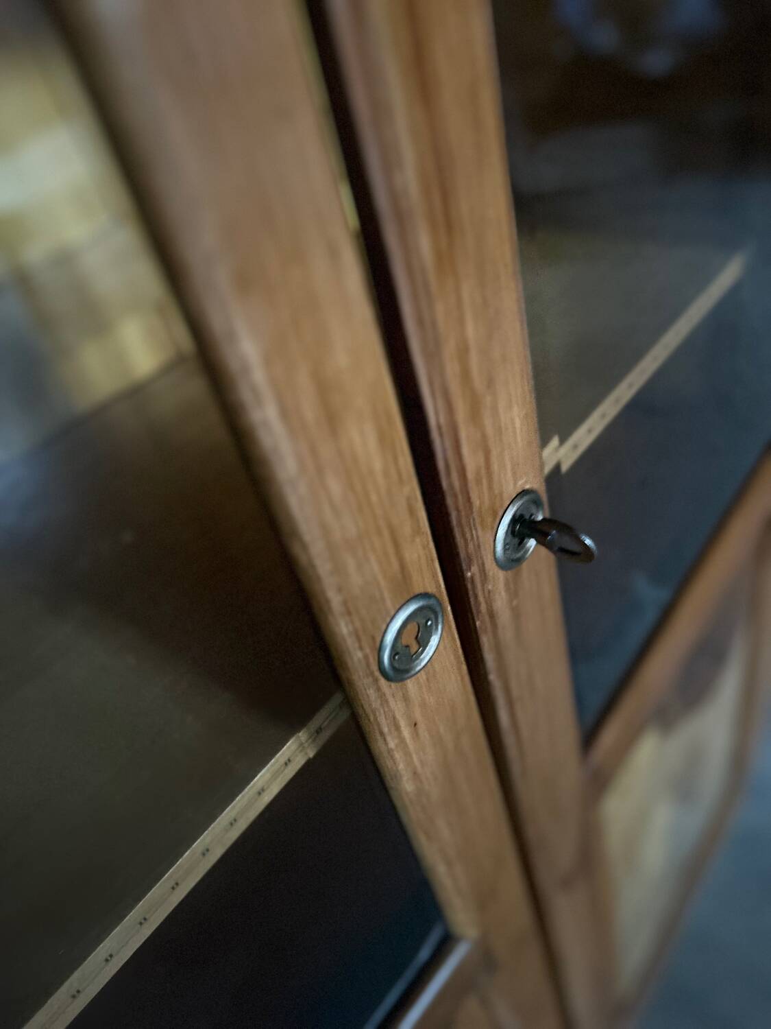 Small cabinet – Art Deco style bookcase in light wood with beveled glass.
