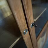 Small cabinet – Art Deco style bookcase in light wood with beveled glass.