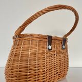 Woven wicker basket with handle
