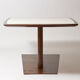 Brutalist conference table made of wood and steel