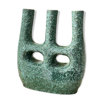 Artisanal vase in black and blue.