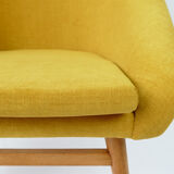Fauteuil coque jaune vintage