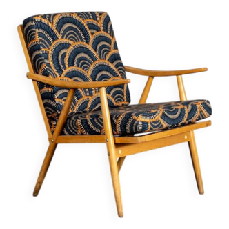 Fauteuil Boomerang tissu style art déco