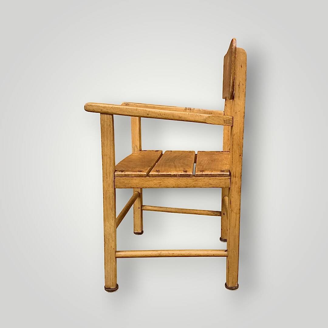 Antique wooden children's chair with armrests – marked unifa