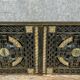 pair of monogrammed cast iron doors from the Art Deco period