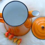 Old orange enamel coffee maker