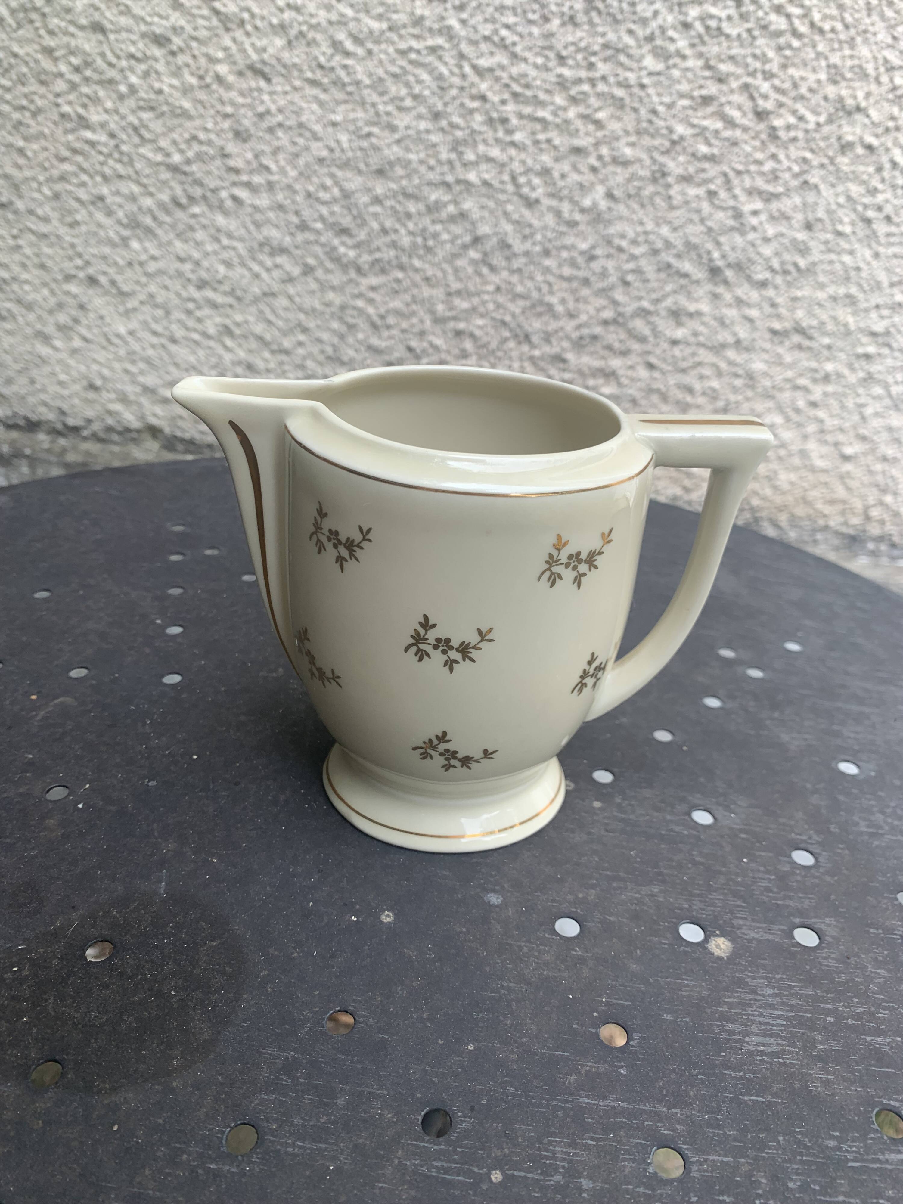 Antique porcelain sugar bowl and milk jug from the Royal Factory of Limoges, France