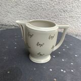 Antique porcelain sugar bowl and milk jug from the Royal Factory of Limoges, France