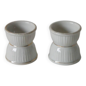 pair of white pleated earthenware egg cups 1950