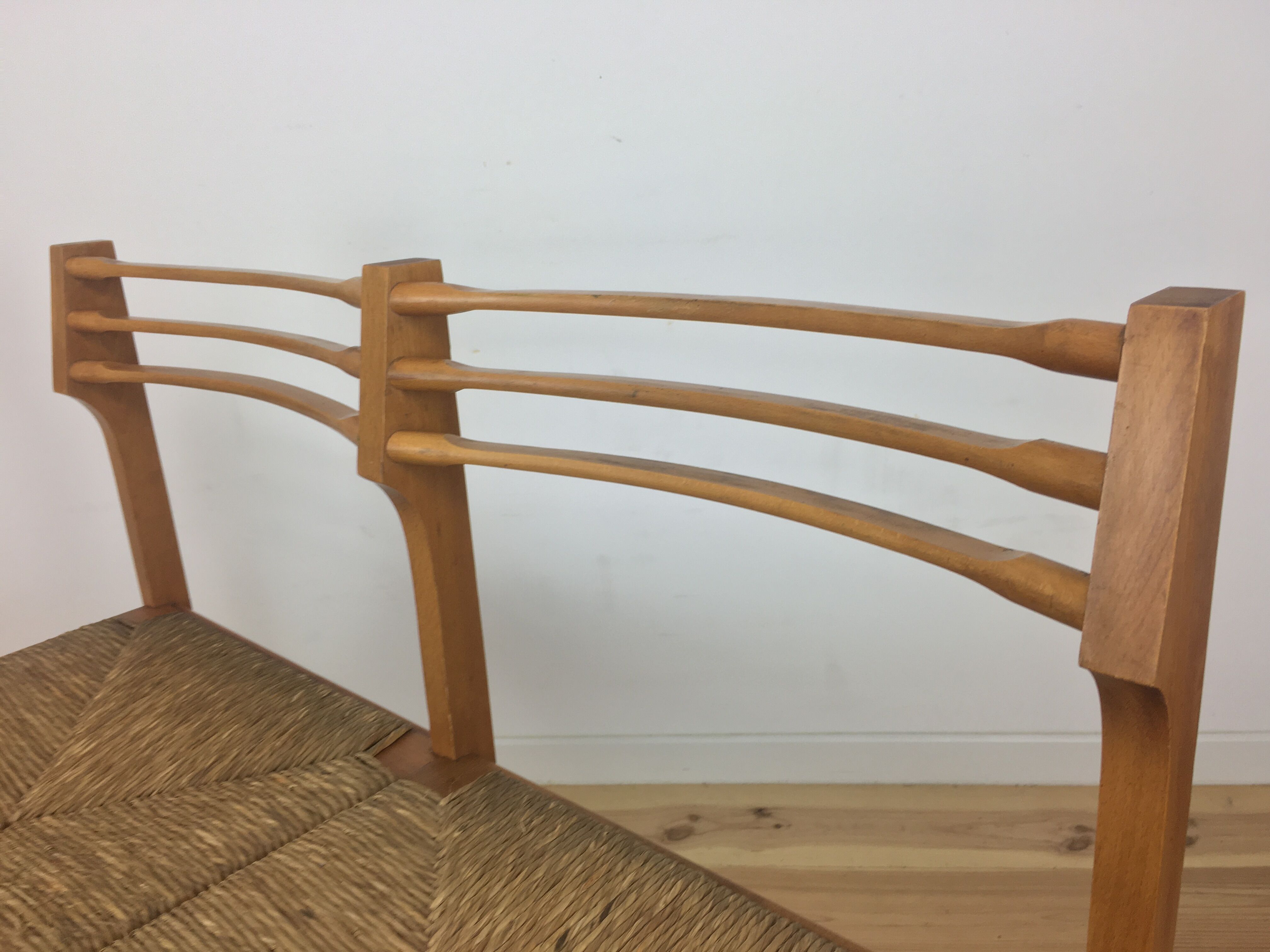 Wooden mulched modernist bench in 1950s