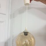 Vintage globe pendant in amber bubble glass