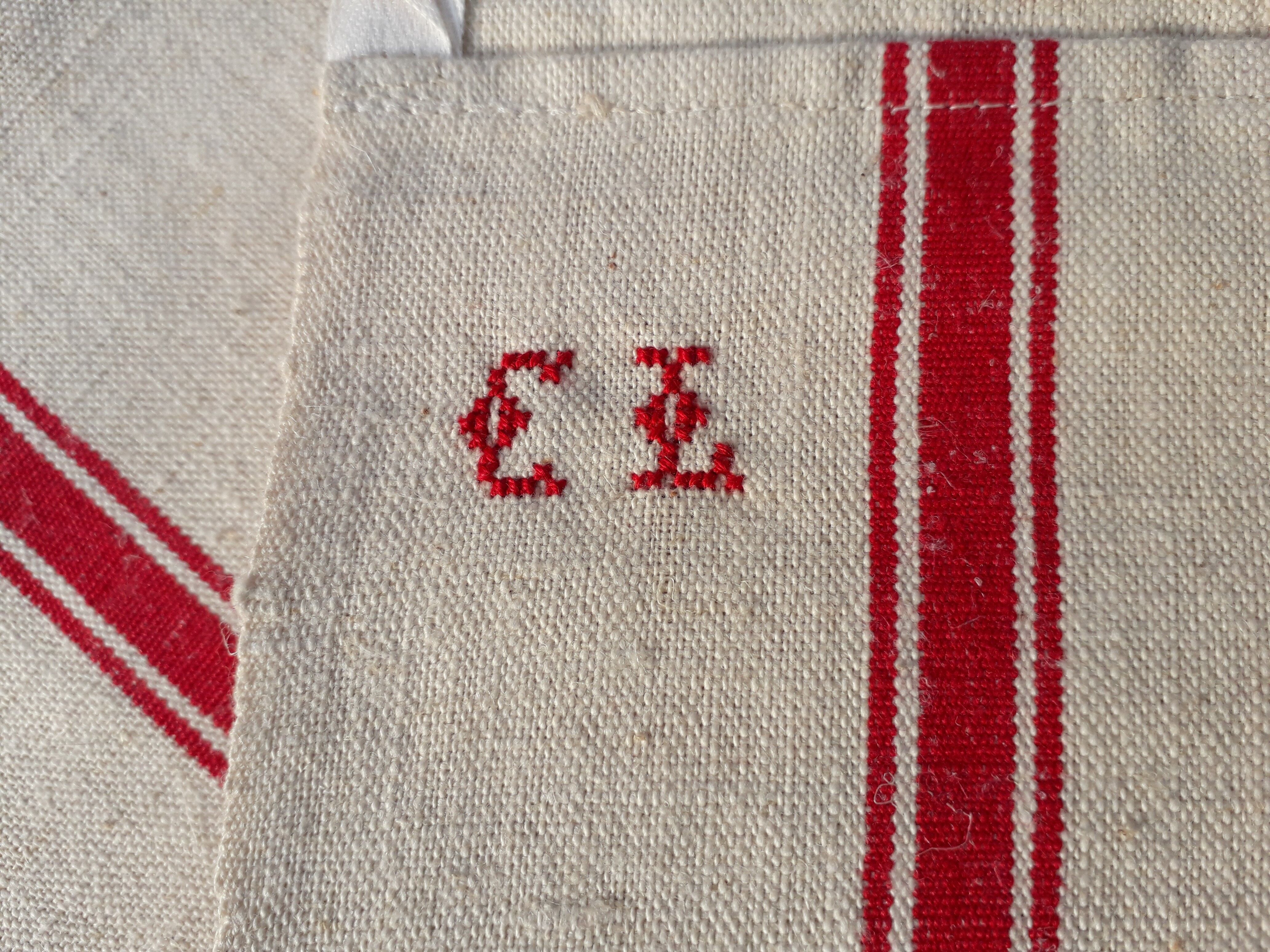 Set of 4 old embroidered tea towels in linen