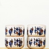4 tea cups with delicate floral pattern