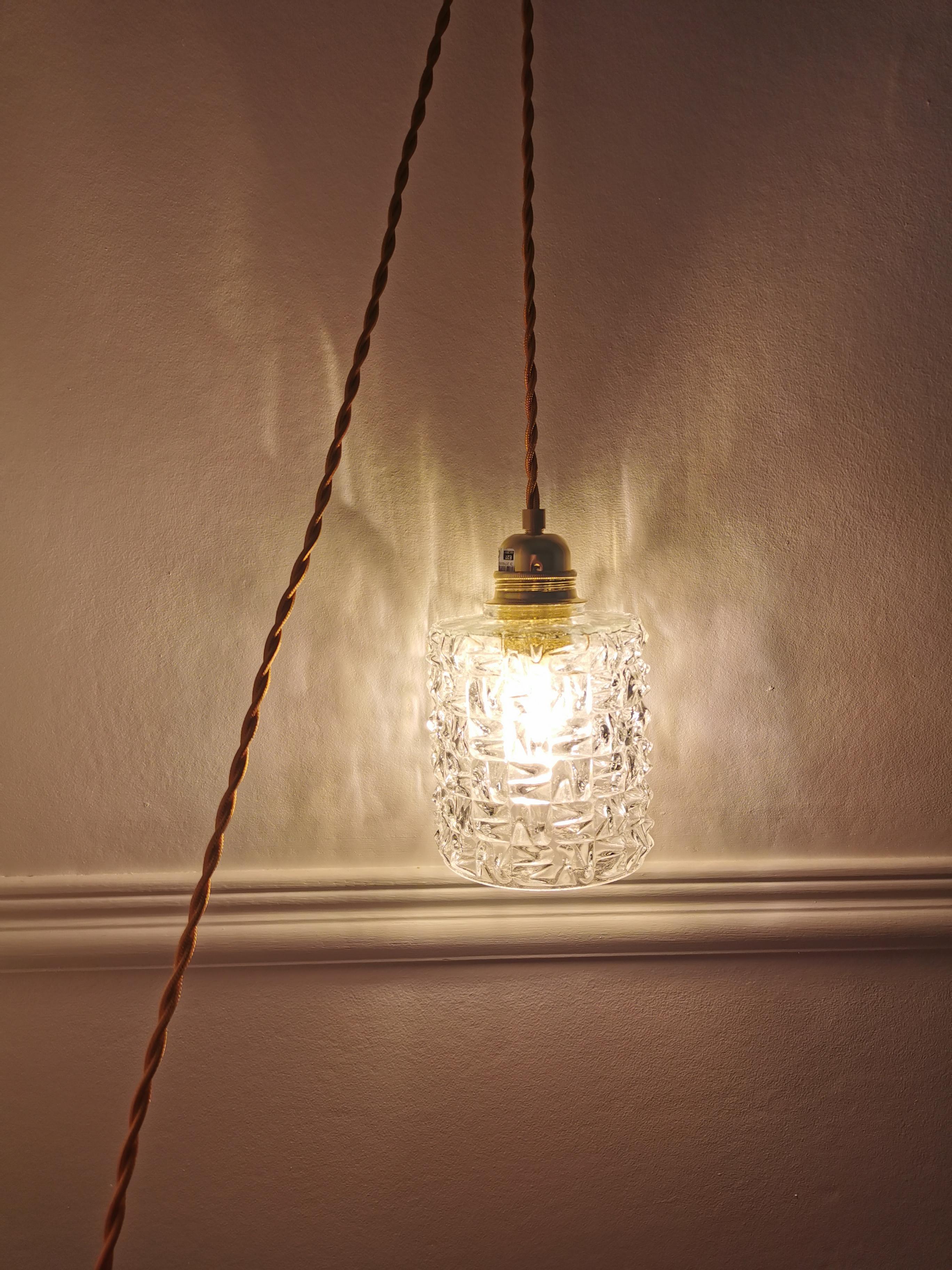Chiseled glass hand lamp