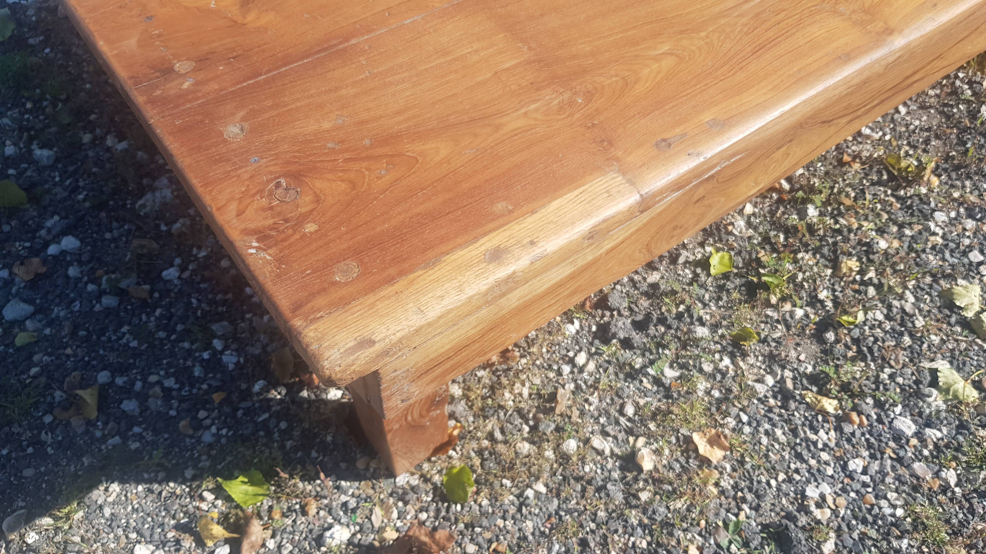 Old industrial workshop coffee table made of solid teak.
