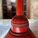 Vintage red enameled sheet metal pendants