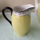 Sugar bowl and milk jug in porcelain