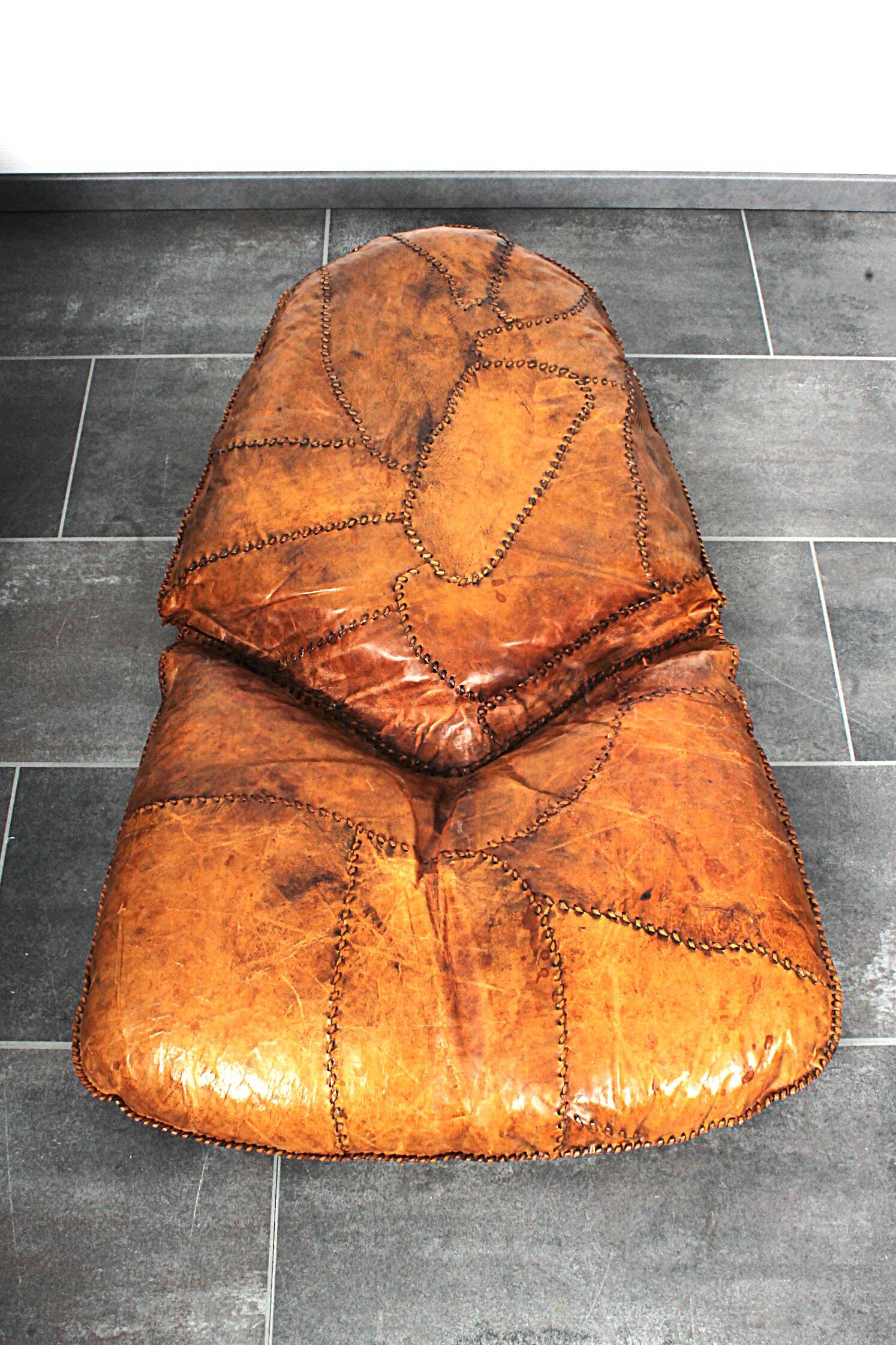 Brutalist oak lounge chair and ottoman, 1970s, set of 2