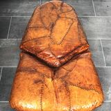 Brutalist oak lounge chair and ottoman, 1970s, set of 2