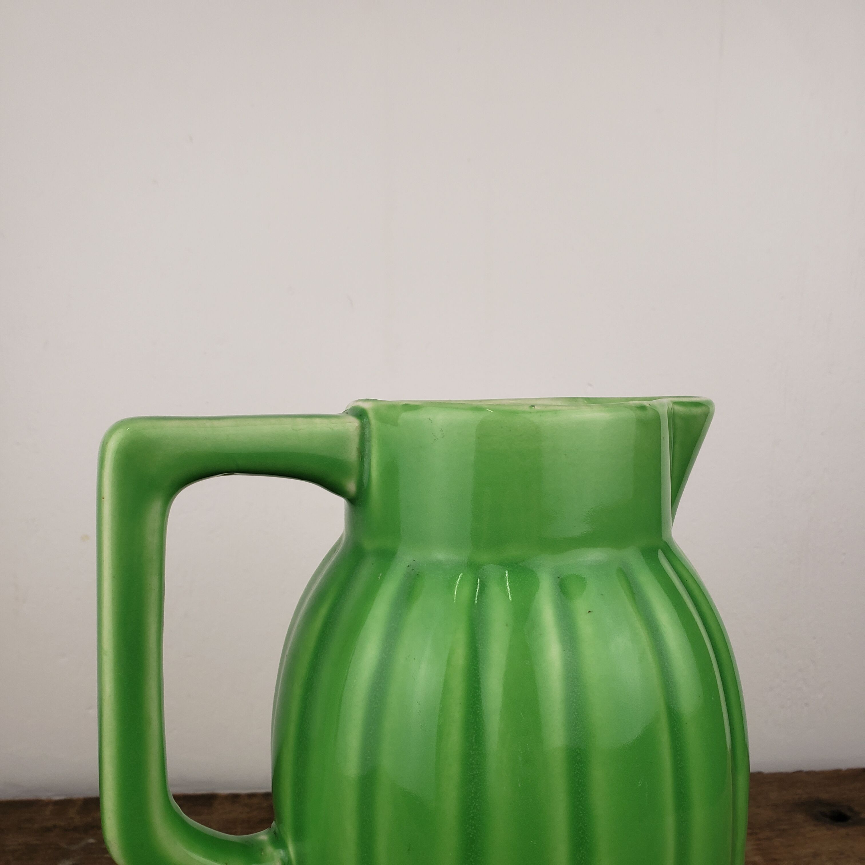 Old green pitcher