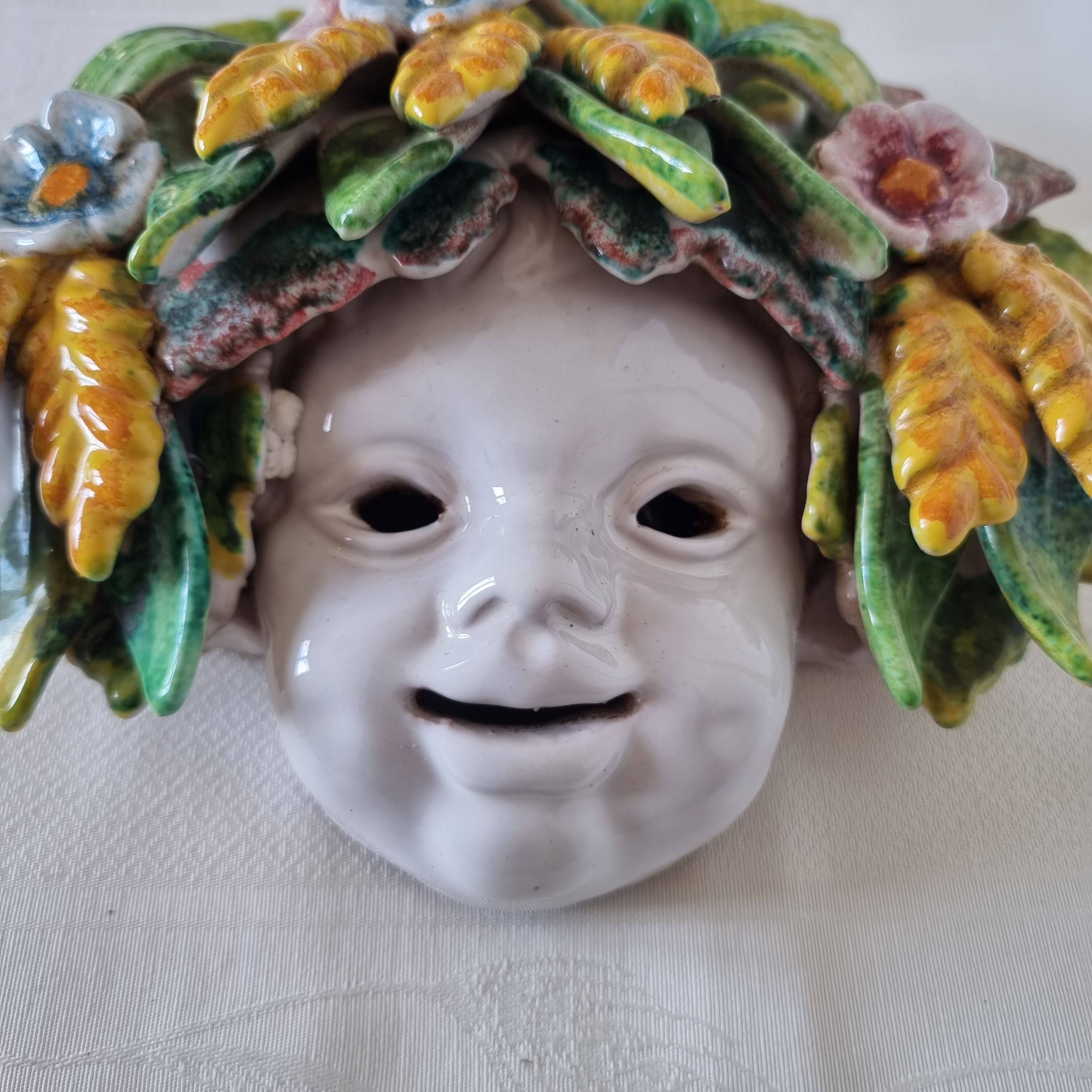 Vintage Italian ceramic wall mask, handmade, decorated with floral details