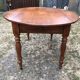 Louis Philippe oval drop-leaf table in solid cherry wood with 2 drawers.