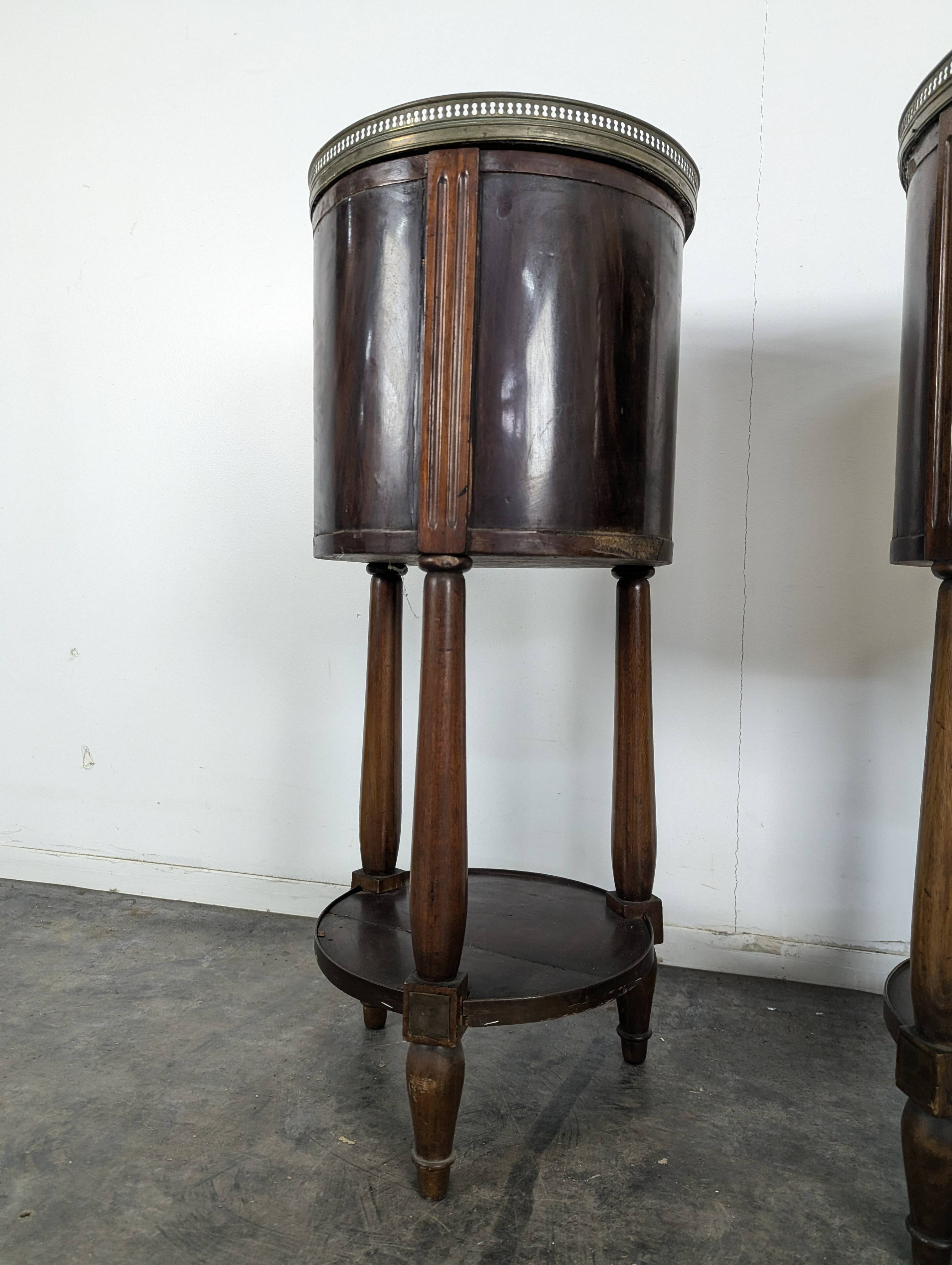 Pair of Louis XVI style bedside tables with a gallery.