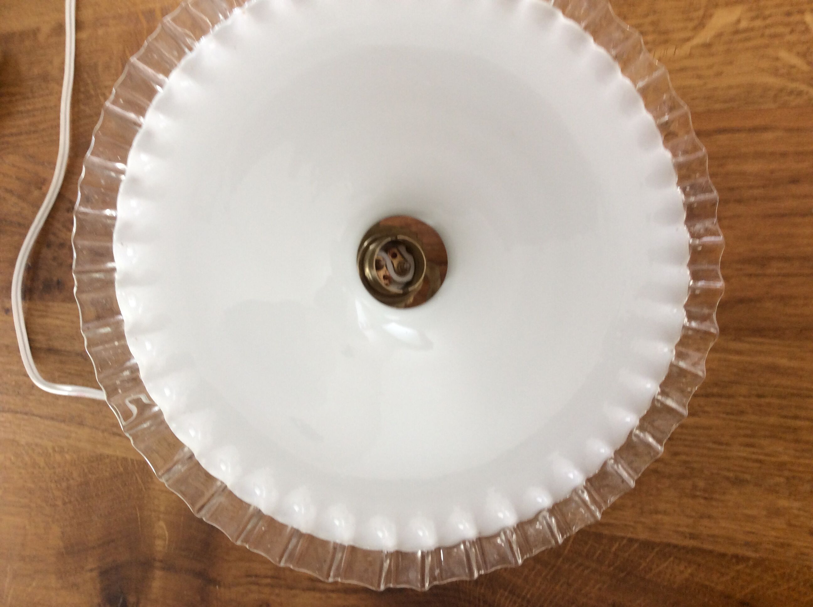 Old hanging lamp in dented opaline