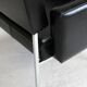 Paire de fauteuils piètement inox, simili-cuir noir, France, circa 1970